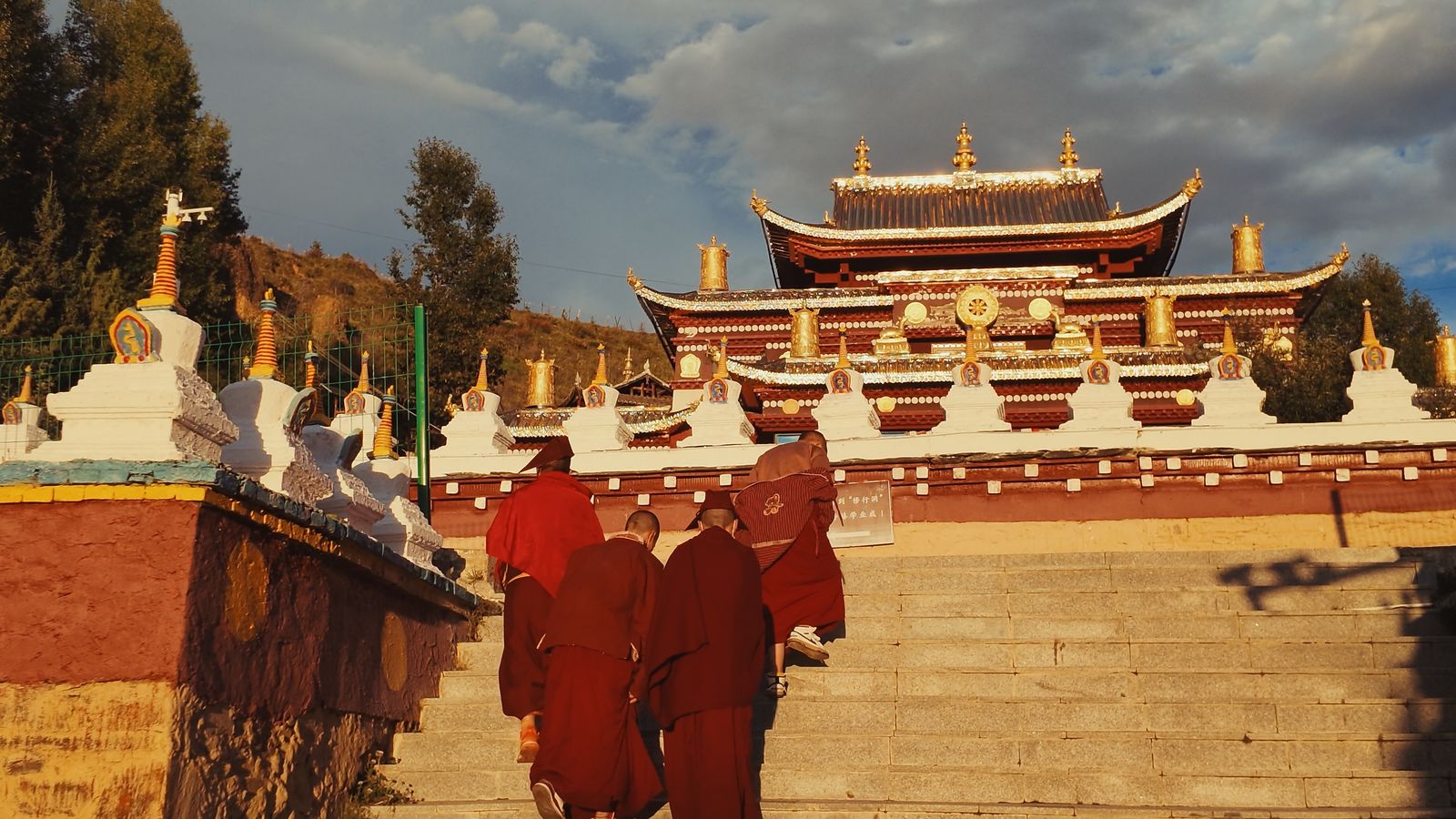 Monks arriving for prayers, Litang